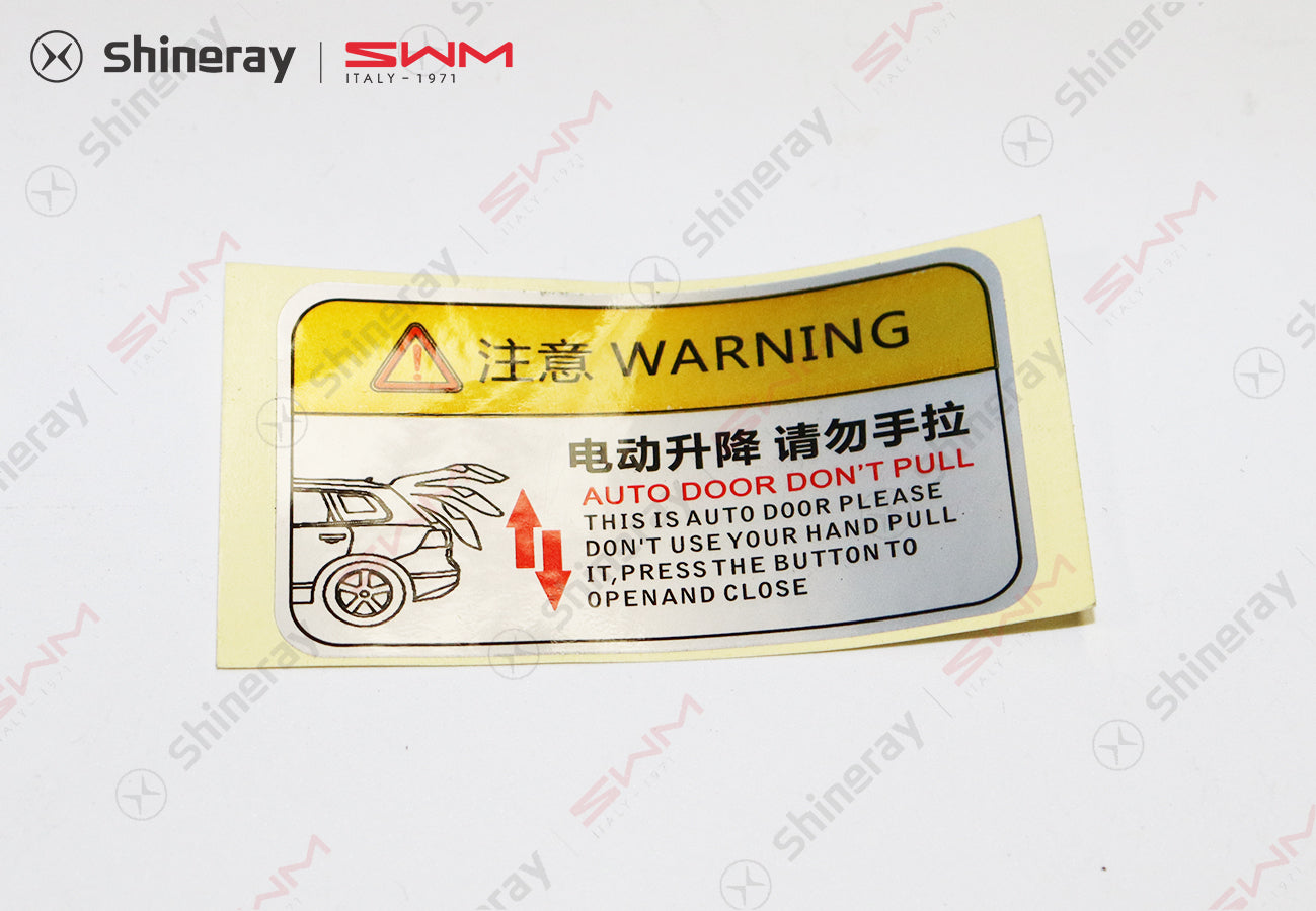 6309109-E0010-A000000>Electric tailgate warning label