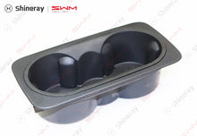 7005203-E0010-A000000>Armrest cup holder